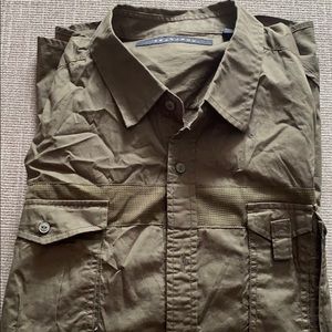 A SEAN JOHN LONG LONG ARMY GREEN SHIRT.